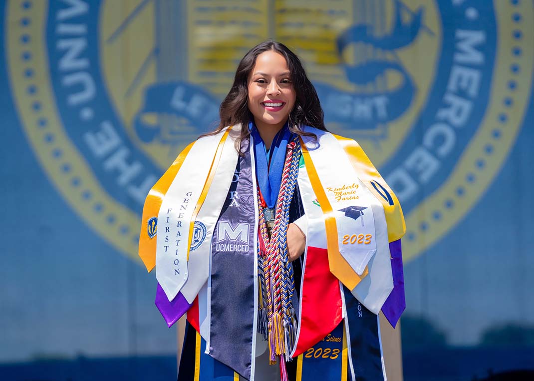 Kimberly Farias in her graduation attire